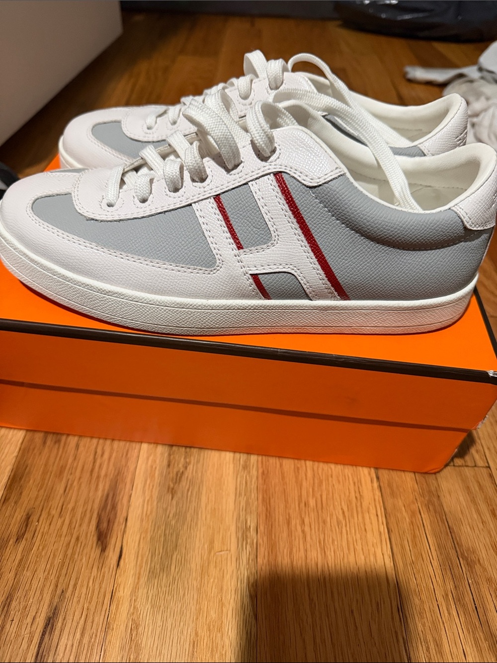 Hermes Men’s White & Gray Low-Top Sneakers with Red Stripe